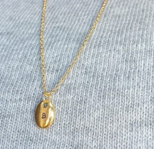 Personalized Jewelry Gift Ideas- Tiny Gold Initial Necklace on Dainty Chain: http://aftcra.com/thedaintypear/listing/6683/gold-initial-necklace-on-18k-dainty-chain